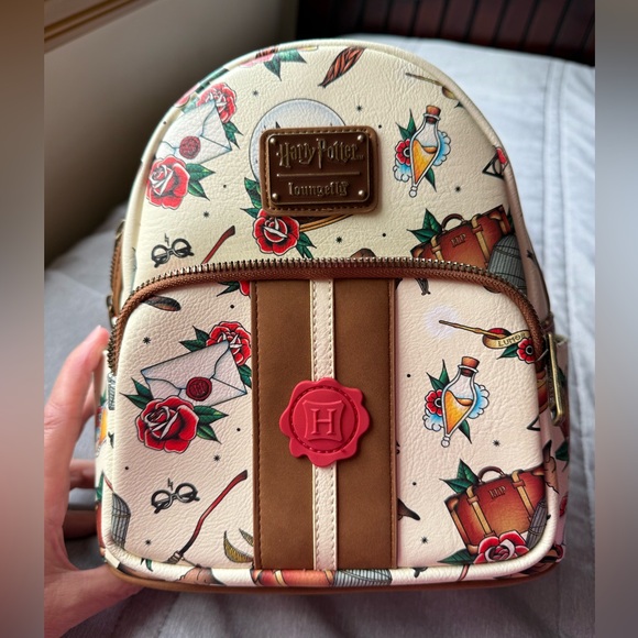 Loungefly Harry Potter by Loungefly Rucksack Hufflepuff House Tattoo online bestellen | MÜLLER